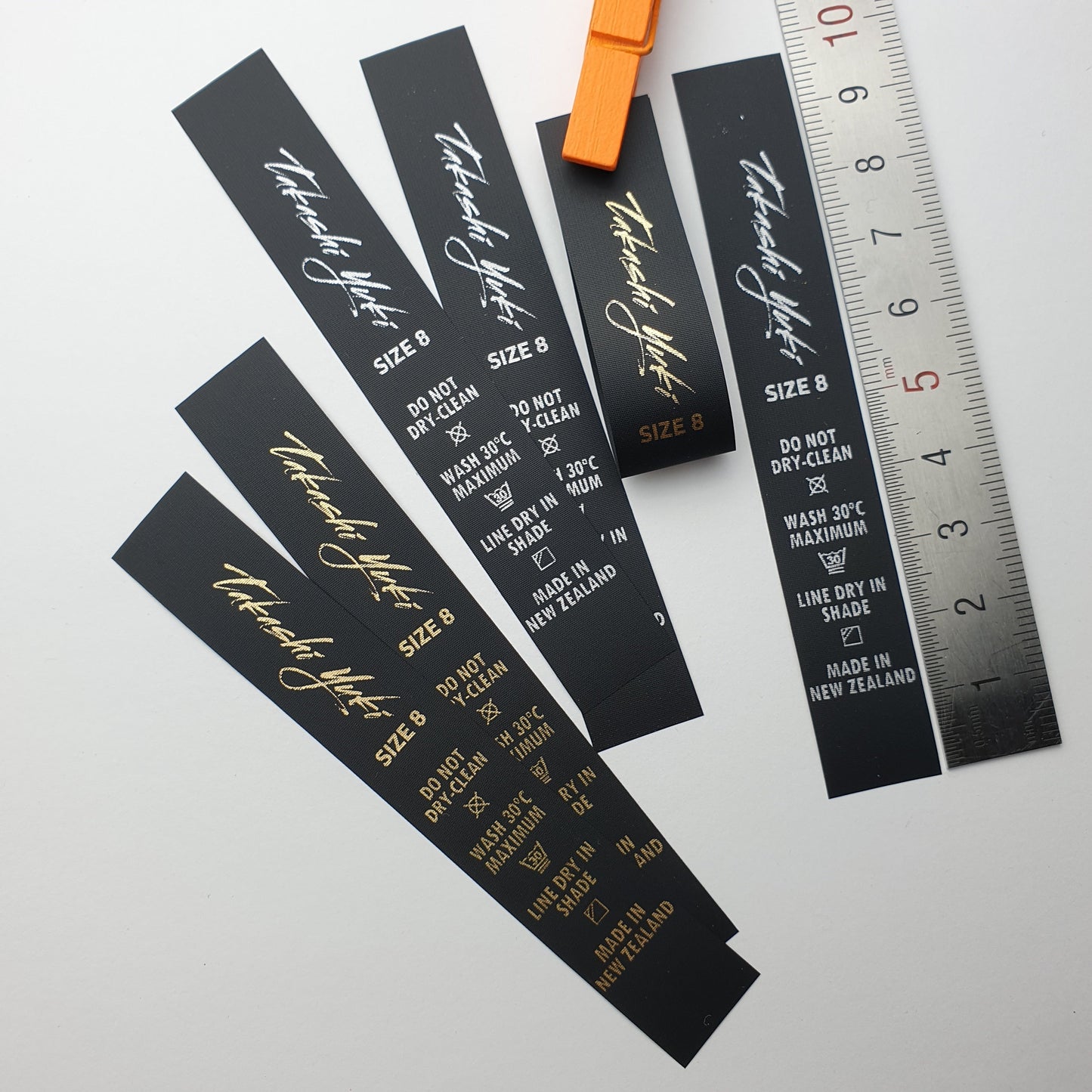 #01BPT - BLACK NON FRAY TAPE LABELS WITH LOGO &/OR INFO